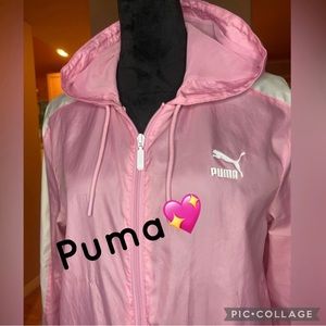 Puma Pink Wind Breaker has a tiny  spot on the left arm firm on price